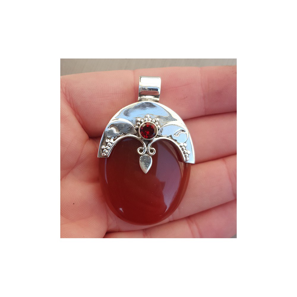 Silver pendant set with oval Carnelian, and round facet Garnet