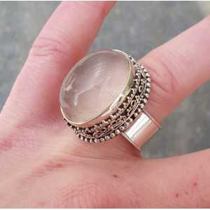 Silver ring with oval rose quartz and carved head 18 mm