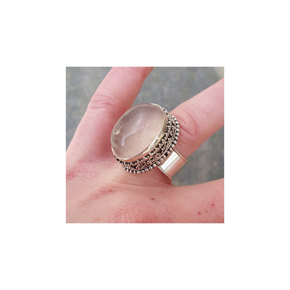 Silver ring with oval rose quartz and carved head 18 mm