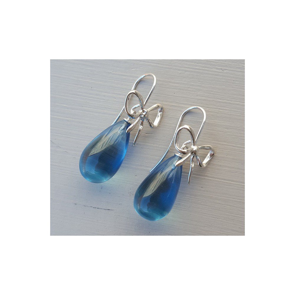 Silver earrings with blue Topaz quartz