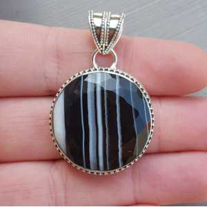 Silver pendant round faceted Botswana Agate carved setting