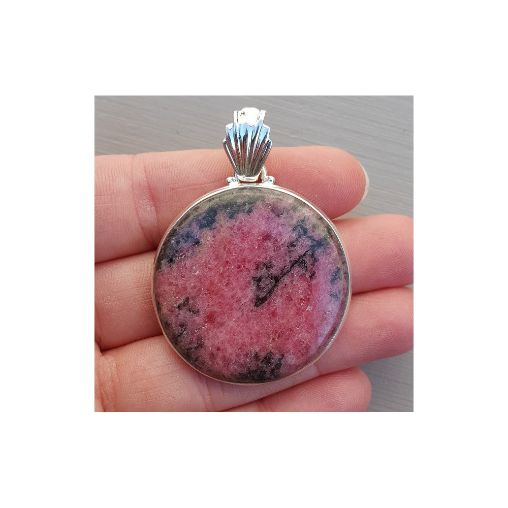 Silver pendant set with large round cabochon Rhodonite