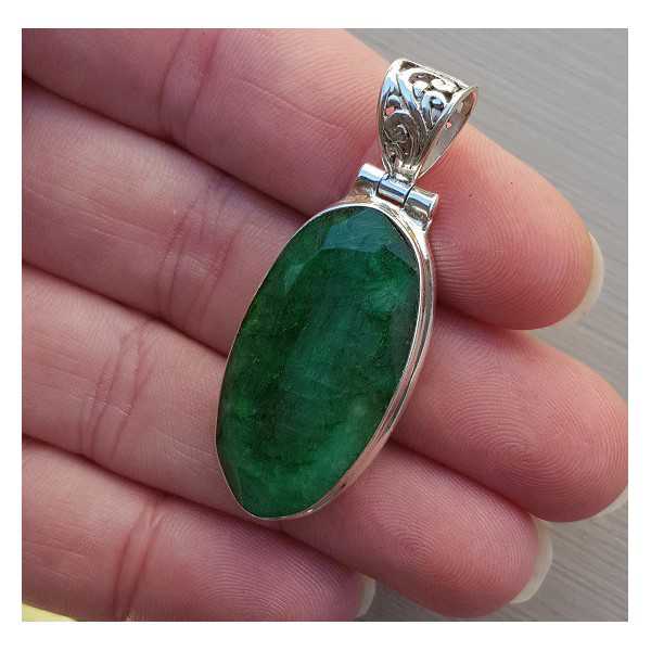 Silver pendant set with facet cut Emerald