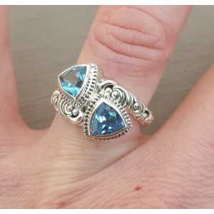 Silver ring set with two blue Topazes 16.5 mm