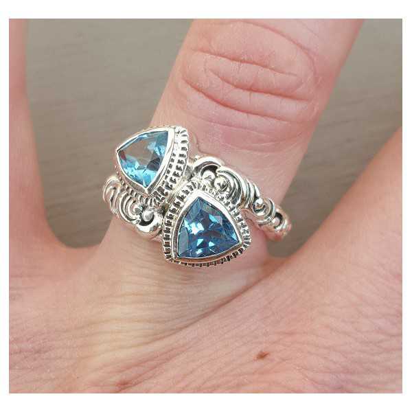 Silver ring set with two blue Topazes 16.5 mm