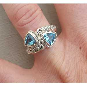 Zilveren ring gezet met twee blauwe Topazen 16.5 mm
