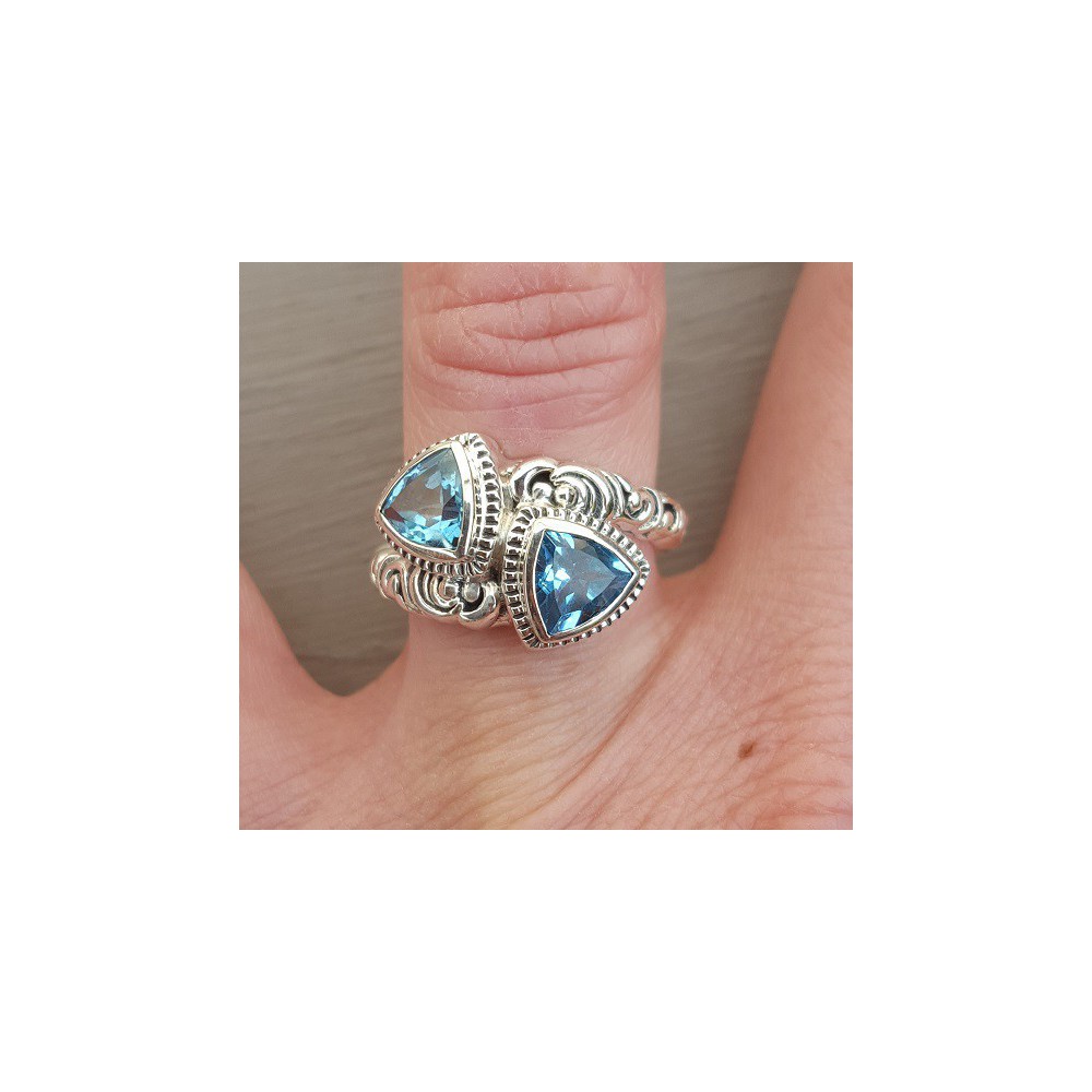 Silver ring set with two blue Topazes 16.5 mm