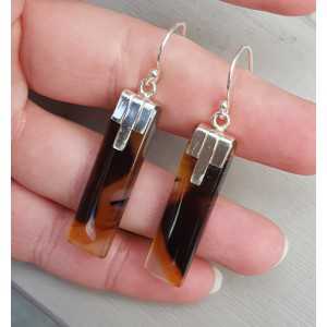 Silver earrings set with rectangular Montana Agate
