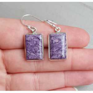 Silver earrings set with rectangular Charoiet