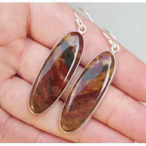 Silver earrings set with oval cabochon Bloodstone