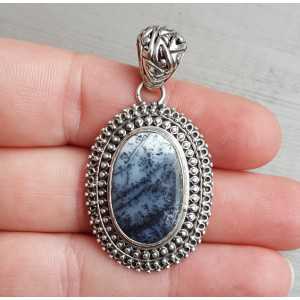 Silver pendant oval Dendrite Opal set in a carved setting