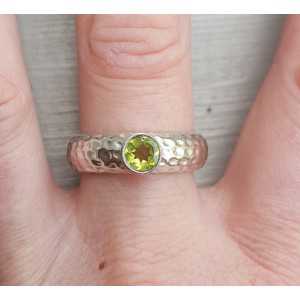 Silver ring set with round faceted Peridot 19 mm