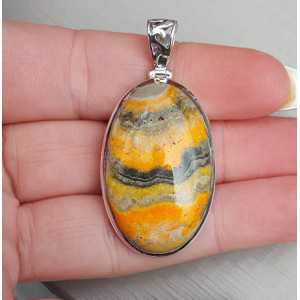 Silver pendant with oval cabochon cut Eclipse stone