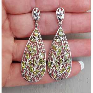 Silver long drop earrings set with marquise Peridot