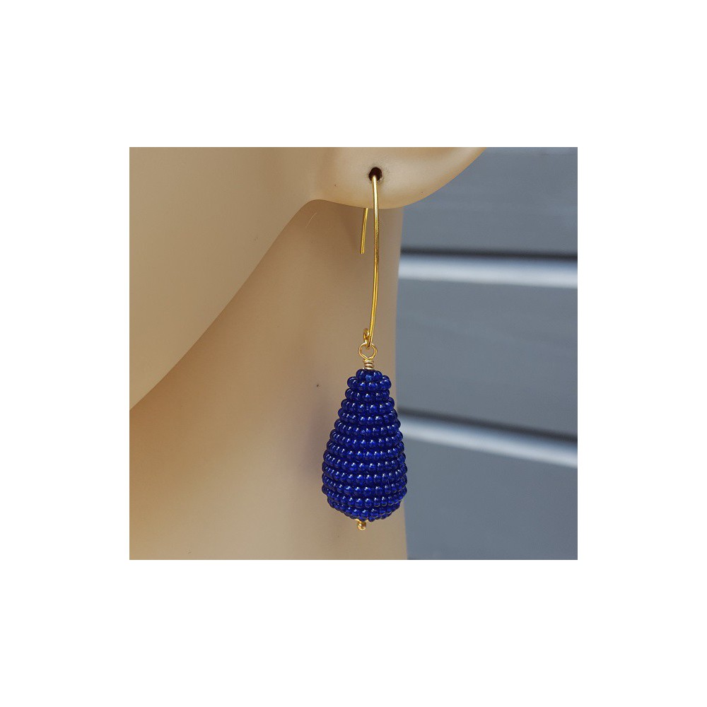 Earrings with a drop of cobalt blue beads